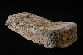 Gray brick originating from tower or wall that was originally connected to the Schiedam gate, brick building material earth