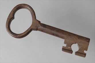 Iron key with heart-shaped eye, hollow key handle and rectangular and round notches in beard, key iron iron, hand forged Key