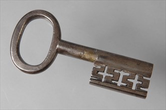 Iron key with oval eye, hollow key handle and cruciform beards in beard, key iron value iron, hand forged Key with oval eye
