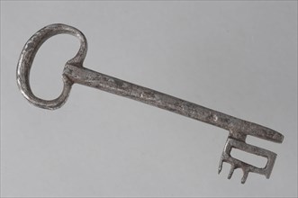 Iron key with heart-shaped eye, massive key handle and cruciform beards in beard, key iron value foundations iron, hand forged