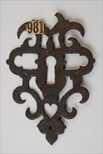 Iron key plate, finished with ajour decor, in renaissance band and scroll ornamentation, keyplate cover plate finishing iron