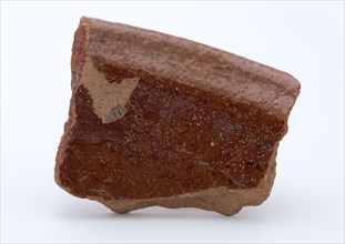 Fragment of red earthenware, partly glazed, fragment crockery holder kitchenware earth discovery ceramic earthenware glaze lead