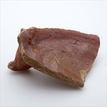 Fragment of red earthenware, partly glazed, fragment crockery holder utensils earthenware ceramics earthenware glaze lead glaze