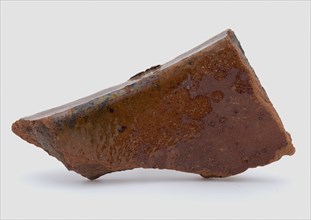Fragment of red earthenware, partly glazed, fragment crockery holder kitchen utensils earthenware ceramics earthenware glaze