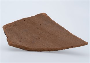 Fragment of red earthenware, fragment crockery holder utensils earthenware ceramics pottery, hand-shaped hand-turned baked