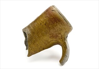 The neck of stoneware jug partly be flamed and partly glazed, drinking jug tableware holder fragment earthenware ceramic