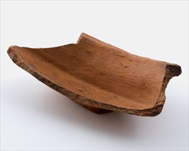 Fragment of red earthenware bowl on stand fins, bin holder soil find ceramic pottery, hand-turned frying Fragment of red