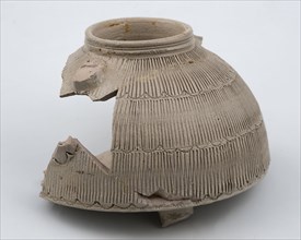 Fragment of stoneware inkwell in the shape of beehive, inkwell fragment soil finding ceramic stoneware glaze salt glaze, edge