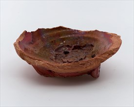 Bottom of small pot on stand lobes, red pottery, pot holder soil find ceramic earthenware clay engobe glaze lead glaze, hand