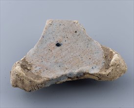 Fragment of prune, soil found ceramic earthenware glaze lead glaze, baked Triangular flat object with points on the three