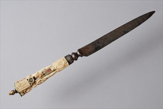 Knife with elaborately decorated ivory handles, including images of Adam and Eve, knife cutlery soil find? iron copper silver