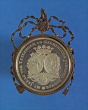 Wedding medal as pendant, from Mr. Isaac van Teylingen, mayor of Rotterdam, and Geertruyda Johanna Bouwer, wedding medal