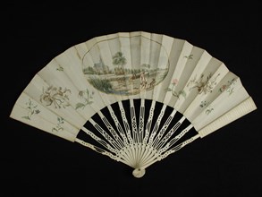 Folding fan, frame of cut bone, paper fan blade with central in gold-oval church and field with threshing farmers