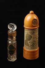 Georg Dralle, perfume bottle bottle product packaging holder cosmetics glass wood paper bottle h 6,2, tube h 8,0, on sleeve