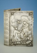 Silversmith: Jean George Grebe, Silver book cover with on the front the apparition of Mary to St. Dominic, cover