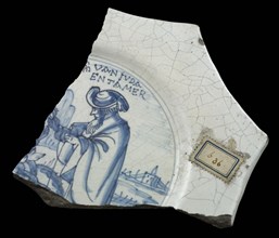 Fragment octagonal faience plate, blue on white, biblical representation and text part, plate dish crockery holder soil find