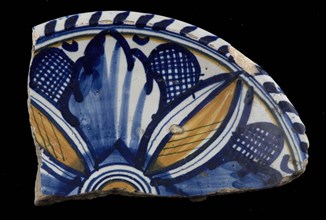 Fragment majolica dish, orange and blue on white, stylized leaf motifs, cable border, plate dish crockery holder earth discovery