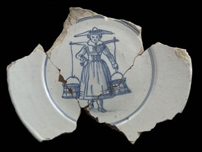 Faience sign with image of woman with yoke in blue, plate crockery holder soil find ceramic earthenware glaze tin glaze lead