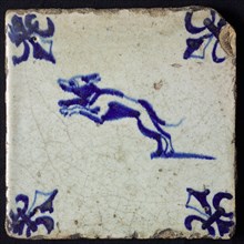 Animal tile, jumping dog, blue on white, corner pattern lily, wall tile tile sculpture ceramic earthenware glaze, baked 2x