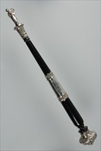 Silversmith: Jean George Grebe, Ebony dirigeer pole with silver fittings, topped with molded sculpture of lyre-bearing Muse