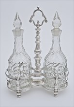 Silversmith: Hendrik van Beest, Silver oil and vinegar set with two identical crystals with two identical caps, oil and vinegar