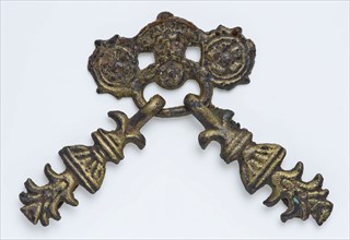 Brass belt buckle or belt hanger embossed in relief: man's head, flowers and vases, belt fittings clothing accessory clothing