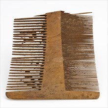 Wooden comb with coarse and fine teeth, comb fragment soil find wood, sawn sanded Undecorated wooden comb Rectangular shape bent