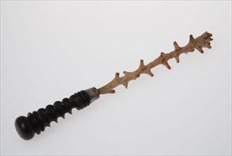 Shroud strut with twisted (ebony?) Wooden handle, in metal setting whimsical twig with many side arms, stirring stick stirrer