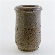 Stoneware ointment jar, white shard, entirely glazed in gray with occasional brown speckles, ointment jar pot holder soil find