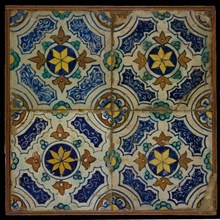 Tile field, four tiles, blue, yellow, orange and green on white, central yellow star in circle, sgraffito surfaces, corner motif