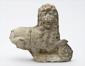 Fragment of polychrome pipe, image, lying, waking lion, sculpture footage earth discovery pottery earthenware pipe earth