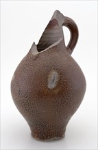 Stoneware Bartmann jug, also called Bellarmine jug, with small rosette on the belly, dark brown mottled glaze, Bartmann
