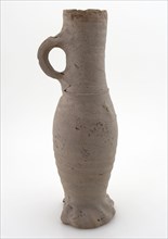 Stoneware jug, Jug or jacobakan, slim model with wide vertical ear, on squeeze foot, Jug or jacobakan jug crockery holder soil