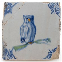 Tile with polychrome owl on branch, corner filling ox's head, wall tile tile footage earth discovery ceramic earthenware glaze