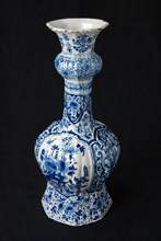 White vase with blue decoration of flowers, knob vase vase crockery holder ceramic earthenware glaze, baked painted glazed part