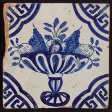 White tile with blue fruit bowl on stand, apples and grapes; corner pattern meander angle, wall tile tile sculpture ceramic