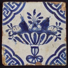 White tile with blue fruit bowl on stand, apples and grapes; corner pattern meander angle, wall tile tile material ceramics