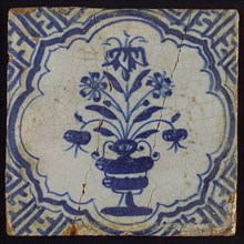 Tile with blue pot with flowers in braid-shaped frame; corner pattern meander, wall tile tile sculpture ceramic earthenware