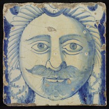 Tile of chimney pilaster, blue on white, head of man with long curly hair and mustache, beginning of shell-shaped headdress