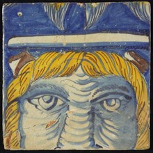 Tile of chimney pilaster, blue, yellow, brown on white, three-quarter head with strands of yellow hair and brown horns, white