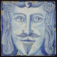 Tile of chimney pilaster, blue on white, part of pillar with head of man with mustache and beard, chimney pilaster tile pilaster