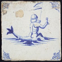Scene tile, naked man with fish tail, bird and flag in the hands, in blue on white, corner motif oxen head, wall tile