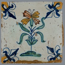 Flower Tile, flower on ground in orange, brown, green and blue on white, corner design lily, corner point orange, wall tile