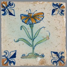 Flower Tile, flower on ground in orange, green and blue on white, corner pattern lily, corner point orange, wall tile