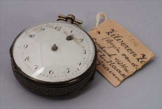 Pocket watch with white enamel dial and bivalve case with windings in dial, pocket watch watch movement measuring instrument