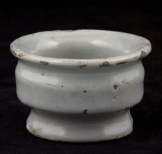 Pottery ointment jar, low model, on base, wide top edge and two constrictions, white glazed, ointment jar pot holder soil found