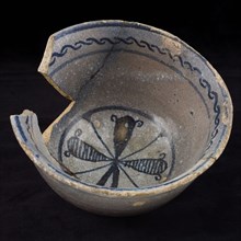 Pottery majolica bowl with simple decoration in blue on white fond, bowl crockery holder soil find ceramic earthenware glaze tin