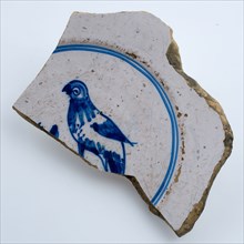 Mirror fragment of faience plate with bird, in blue on white ground, plate crockery holder soil find ceramic pottery glaze tin