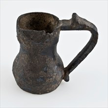 Small pewter jug with belly and ear, jug?, measuring cup? measuring instrument? jug holder soil finds tin metal, cast Small