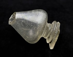 Stem fragment of goblet with hollow baluster, drinking glass drinking utensils tableware holder fragment soil find glass